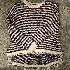 Knit sweater with tassels